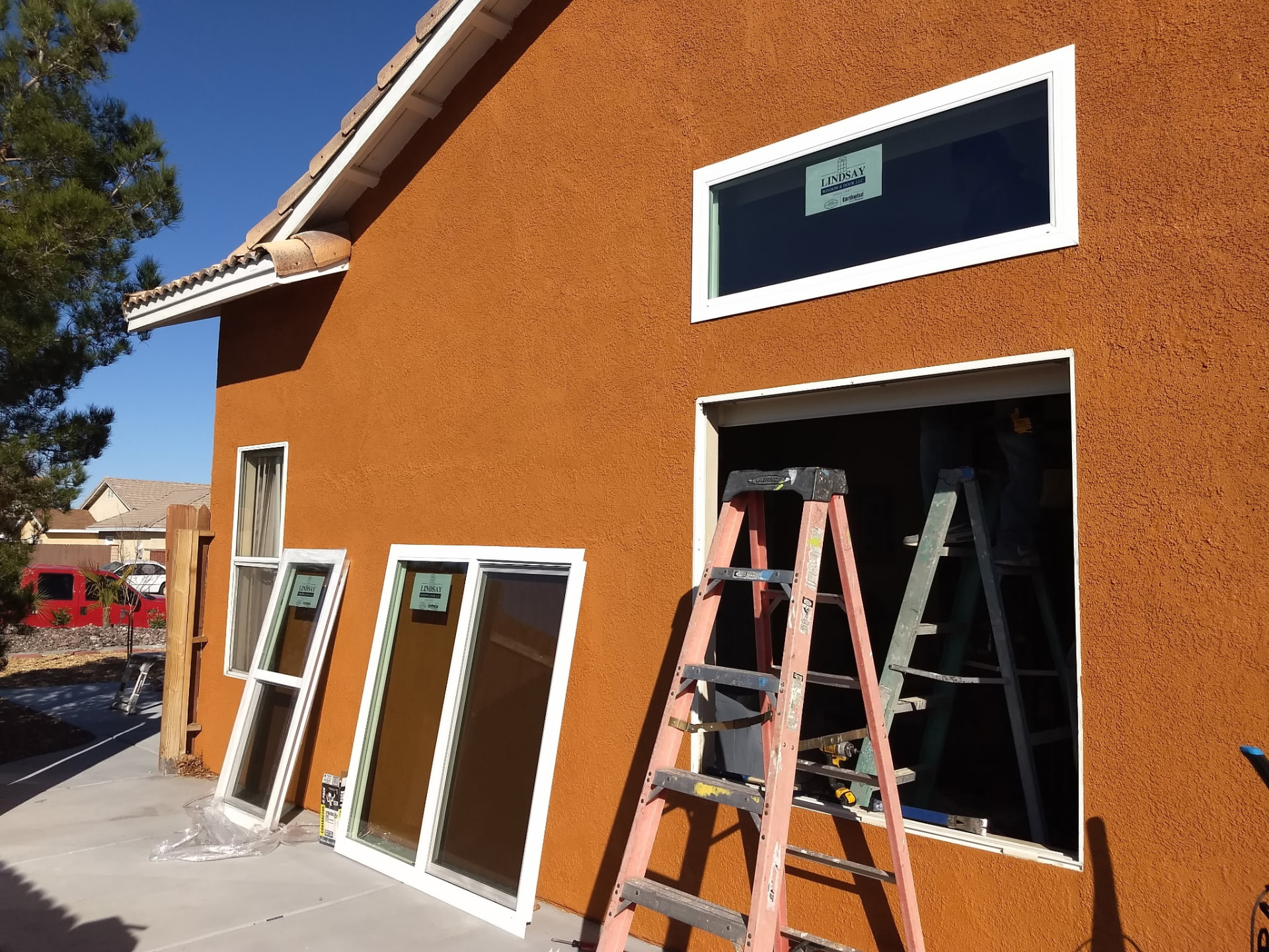 Window replacement & stucco repair